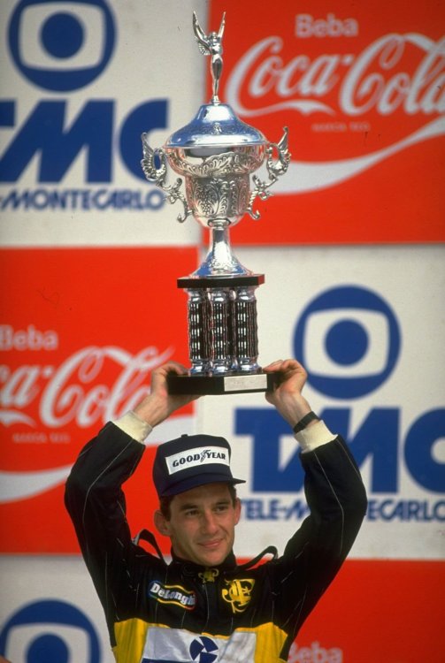 Ayrton-Senna-holds-trophy-after-victory-Brazilian-Grand-Prix-Rio-circuit-March-23-1986.jpg