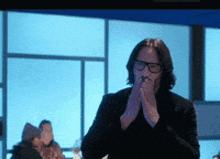 keanu-reeves-kisses.gif